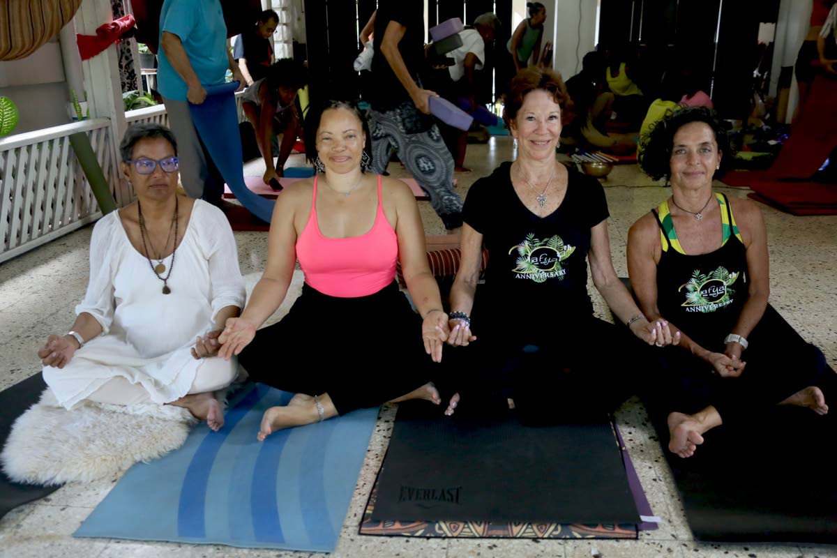 
Sonita Abrahams Burrowes (second right) is grateful to have a team of awesome teachers at Afya Yoga Studio. Following a special session last weekend to mark her 50 years of practising yoga, the teachers (from left) Tina Kirkpatrick, Trishan Haughton and H