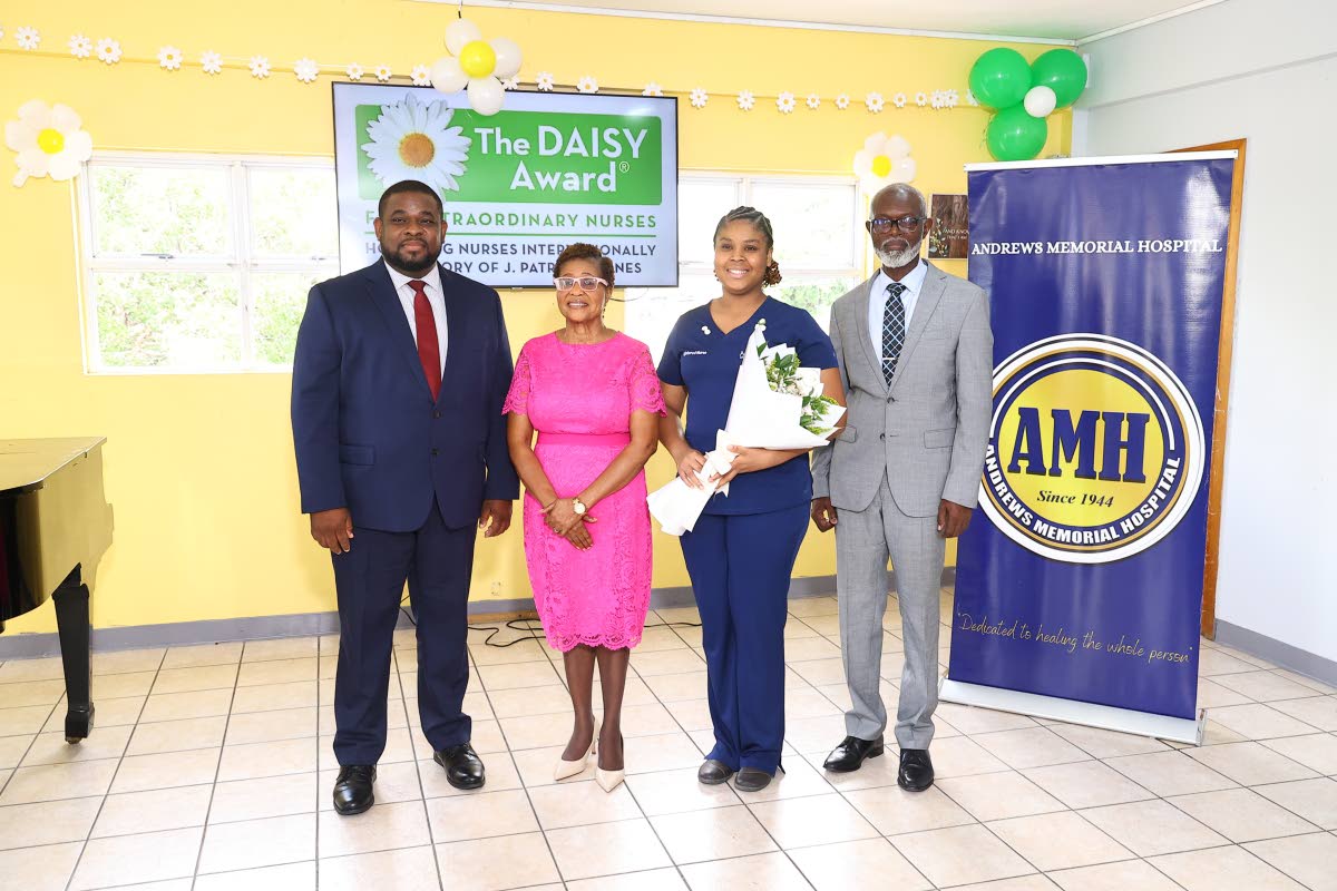 Lady Allen (centre), wife of Jamaica’s Governor-General and a former registered nurse, is flanked by Donmayne Gyles (left), president and chief executive officer of Andrews Memorial Hospital, and Merissa Geoghagen (right), the hospital’s inaugural DAIS