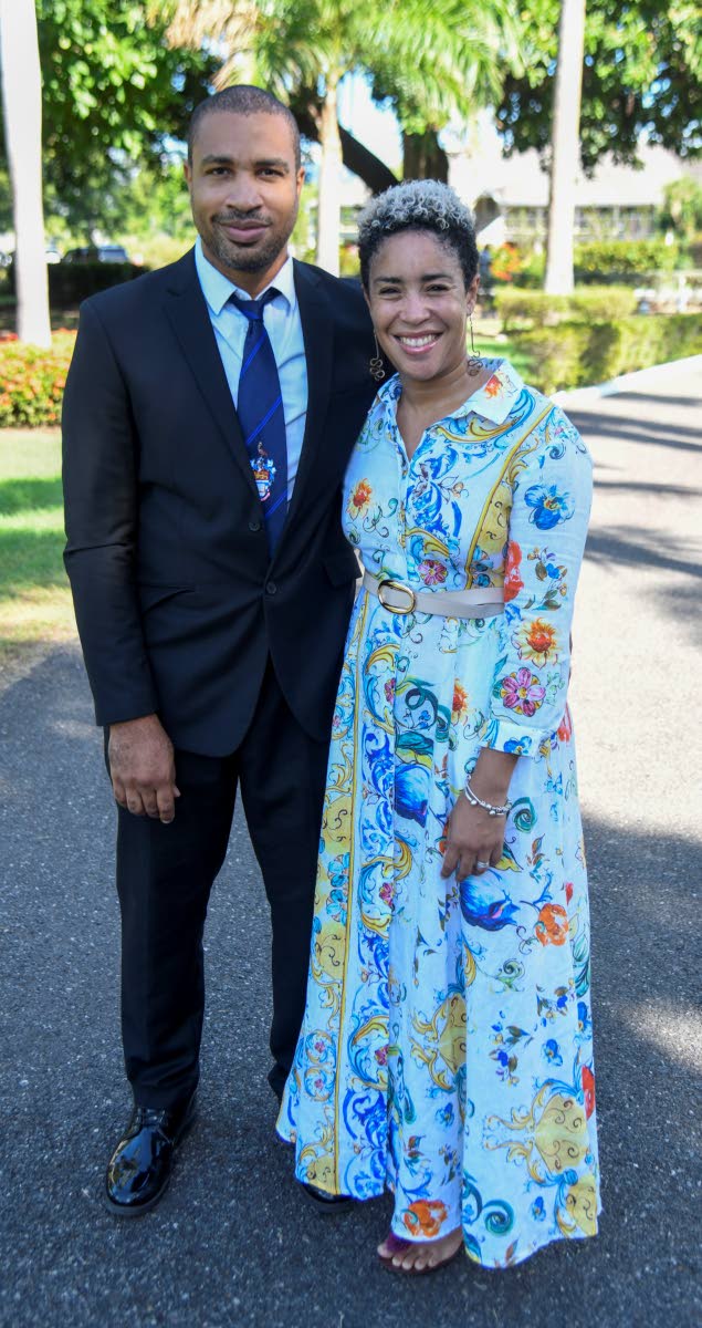 Husband-and-wife duo Dr Peyton Lawrence and Dr Jodi James are all smiles upon arrival.