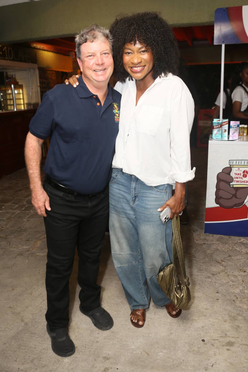 Jason Henzell, founder and co-director of the Treasure Beach Food, Rum and Reggae Festival, shares a frame with creative producer Carleene Samuels.