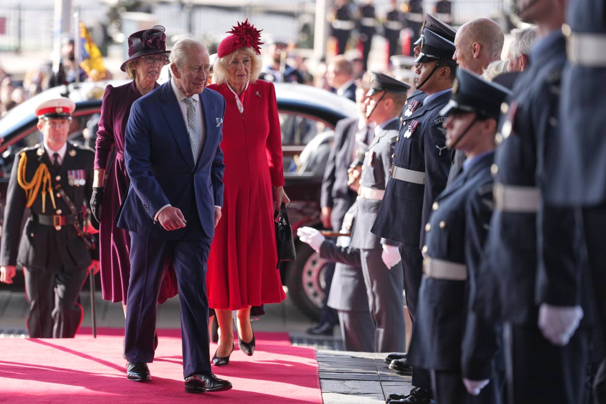 
Britain’s King Charles III and Queen Camilla arrive to attend the Ceremonial Opening of the Seventh Senedd in Cardiff, Wales.