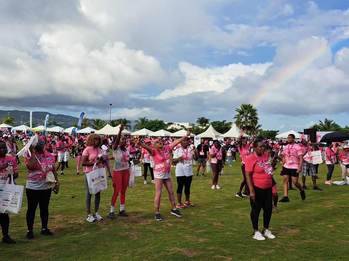 Participants in the Kiwanis Club of Providence – Montego Bay’s 17th annual 5K run/walk/wheelchair event for breast cancer awareness, engaging in activities at the Harmony Beach Park in Montego Bay, St James following the 5K event, which took place on S