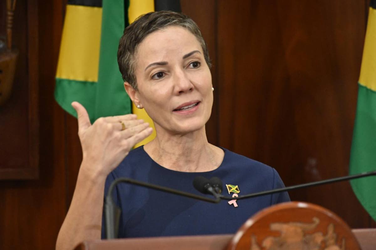 Senator Kamina Johnson Smith, minister of foreign affairs and foreign trade, addresses yesterday’s post-Cabinet meeting at Jamaica House in St Andrew. 