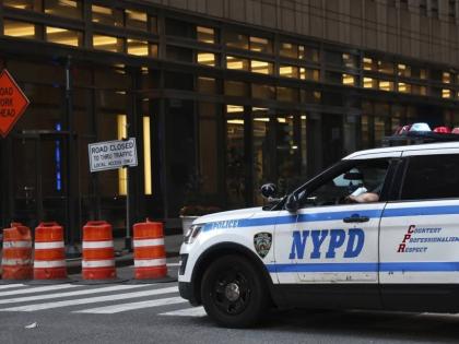 An NYPD cruiser sits at the intersection of a Midtown street closed due to construction, Thursday, November 7, 2024, in New York. 