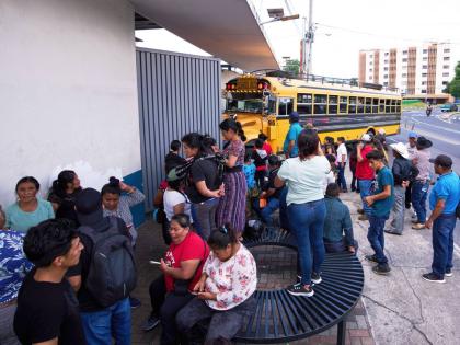 People wait for loved ones from Guatemala deported from the United States outside La Aurora International Airport, in Guatemala City, August 31, 2025. (AP Photo/Moises Castillo, File)