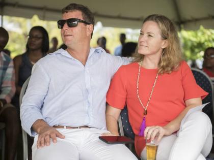 Jason Henzell (left) and his wife, Laura.