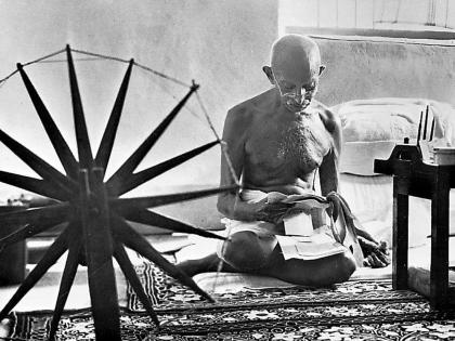 In this photo Gandhi is seen with the ‘charkha’ or the spinning wheel. 