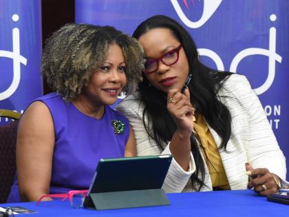 Dr Kasan Troupe (right), permanent secretary in the Ministry of Education, Skills, Youth and Information, and Minister of Education, Skills, Youth and Information, Senator Dr Dana Morris-Dixon.