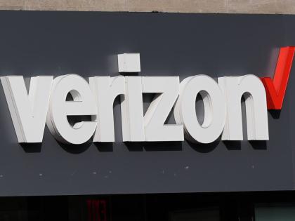 
A Verizon sign is displayed on a store, September 30, 2025, in Cambridge, Massachusetts. 
