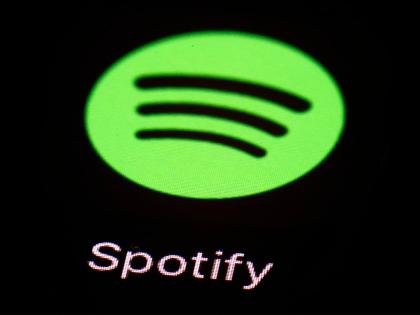 This March 20, 2018 file photo shows the Spotify app on an iPad in Baltimore.
