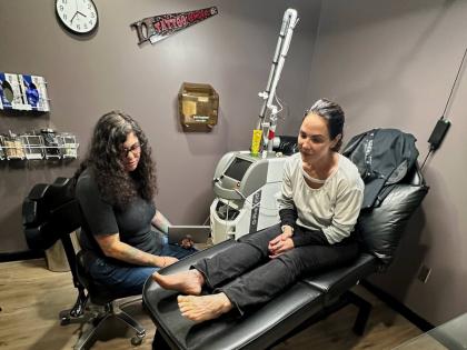 
Tracy Herrmann says the four tattoos getting lasered are part of her past and that’s where she wants them to stay.