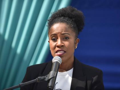 Andrea Dempster-Chung-Executive Director, Kingston Creative, giving an overview of the Paint the City Project at the Paint the City Mural Launch, held on  March 14, 2024 in Downtown, Kingston.