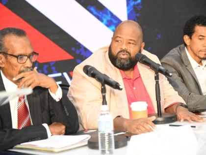 From left: Dr Ian Blair, acting chairman; Solomon Sharpe, CEO; and Richard Bair, COO, address shareholders at the Main Event Entertainment Group Limited annual general meeting at the Spanish Court Hotel on St Lucia Ave in New Kingston on Thursday, July 6, 