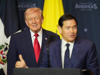 President Donald Trump listens while Secretary of State Marco Rubio speaks at the Shield of the Americas Summit, Saturday, March 7, 2026, at Trump National Doral Miami in Doral, Florida.