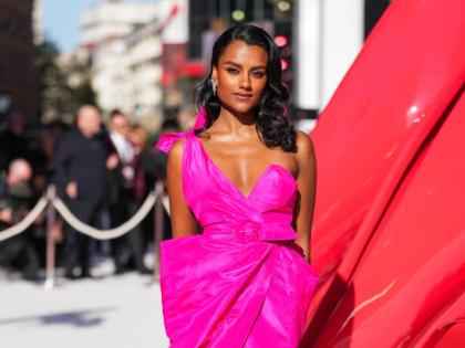 Simone Ashley stuns in archival Mugler – a one-shoulder fuchsia dress from Thierry Mugler’s 1984 resort collection.