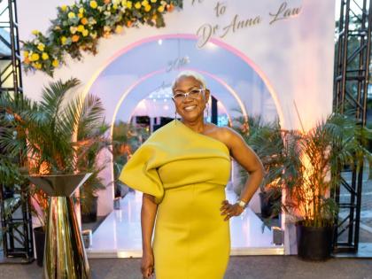 Dr Anna Law, founder of Align Orthodontics, poses in a vibrant midi as she marks the practice’s 30th anniversary.