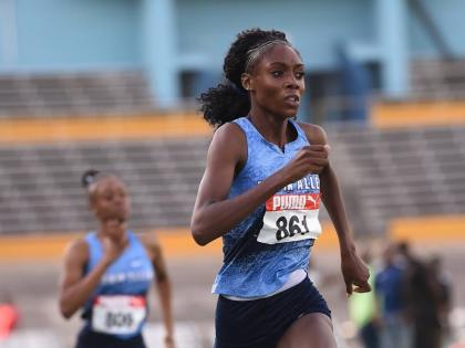 Kevongaye Fowler wins heat 2 of the Under-20 girls 400 metres at the World Under-20 and CAC Games Departure Meet at the National Stadium on Saturday.