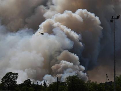 A pyrocumulonimbus, or pyroCb – a giant cloud created by a large wildfire – is seen in the Fontainebleau forest region, about 60 kilometers (37 miles) south of Paris, France. – AP photo