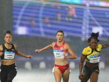 From left: Zoe Hobbs of New Zealand, Amy Hunt of England, and Jonielle Smith of Jamaica compete in a women’s 100 metres semi-final at the Commonwealth Games in Glasgow, Scotland, yesterday.