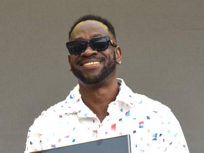 Rodney Price shows off the Key to the City of Kingston after it was presented to him by the Mayor of Kingston Andrew Swaby. 
