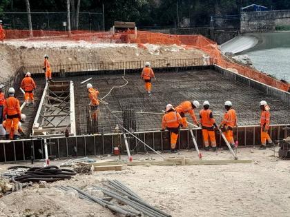 Workers at the Rio Cobre Water Treatment Plant during a site tour on Wednesday.