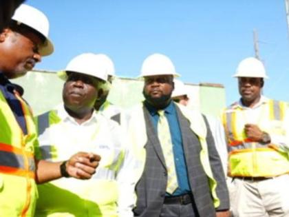 Bahamas Prime Minister Philip Davis (second from left) listens as officials from the Bahamas Power and Light (BPL) explain the situation at the Blue Hills Power Station. 