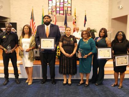 Lishann Salmon (centre), chargée d’affaires at the Embassy of Jamaica in Washington, DC,. poses with recipients of the DMV Jamaica Diaspora Awards during the thanksgiving service marking Jamaica’s 64th anniversary of Independence at the Seabrook Seven
