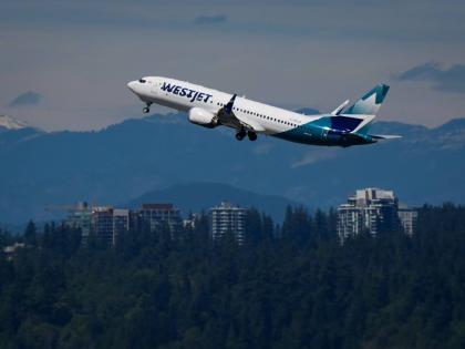 A WestJet Boeing 737 Max aircraft takes off from Vancouver International Airport in Richmond, British Columbia, Canada.