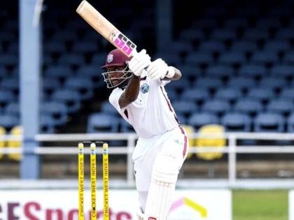Justin Greaves drives through the offside during his unbeaten half-century against Pakistan on the opening day of the second cricket Test at Queen’s Park Oval in Trinidad on Sunday.