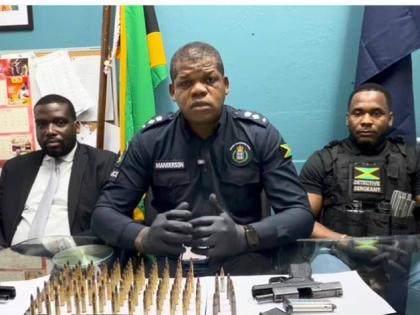 Head of the St Andrew South Police Division, Senior Superintendent Damion Manderson (centre), speaking about an operation on August 4, 2026.
