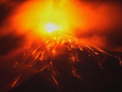 Lava flows out of the crater of the Fuego Volcano, as seen from San Juan Alotenango, Guatemala, Tuesday, Aug. 4, 2026. (AP Photo/Moises Castillo)
