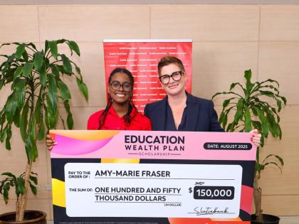  President of Scotia Insurance Jamaica Company Limited, Debra Lopez-Spence (right), poses with one of the 2025 Scholarship recipients, Amy-Marie Frasier.