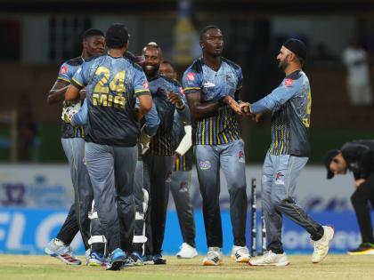 CPL T20/ SmartFrame 
Antigua and Barbuda Falcons celebrate during their nail-biting two-wicket win over Jamaica Kingsmen in the opening match of the Caribbean Premier League (CPL) at Arnos Vale in St Vincent on Friday.