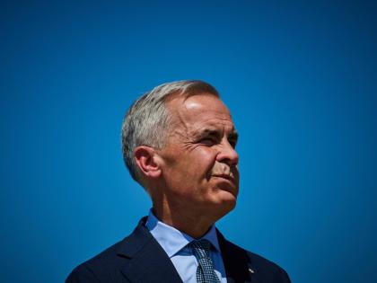 Prime Minister Mark Carney attends a housing announcement in Toronto.