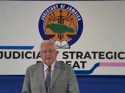 Minister of Justice and Constitutional Affairs, Delroy Chuck, addressing the Judiciary of Jamaica’s annual Strategic Management Retreat, held at the AC Hotel by Marriott Kingston on Monday.