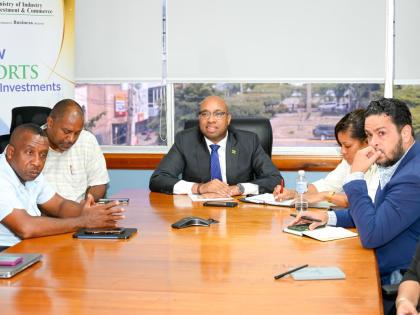 State Minister in the Ministry of Industry, Investment and Commerce, Delano Seiveright (centre), poses with key stakeholders following a recent meeting at the Ministry's offices in New Kingston. Pictured (from left) are Mayor of Kingston and Chairman of th