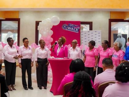 Nadine Spence (centre) the chairperson Kiwanis Club of Providence Montego Bay Breast Cancer Awareness 5K Walk/Run and Wheelchair events,  addresses the audience during the media launch at Grand-A-View Restaurant and Event Place on Thursday, August 20, 2026
