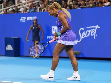 AP 
Serena Williams, of the United States, reacts to a winning point during a women’s doubles match against Marta Kostyuk, of Ukraine, and Peyton Stearns, of the United States, at the Cincinnati Open tennis tournament, on Monday, August 17, in Mason, Ohi