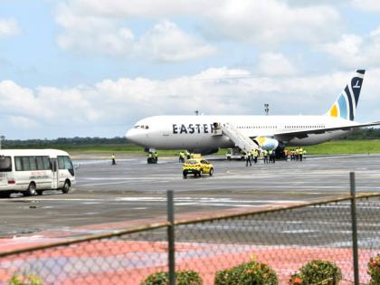 Plane carrying the deportees from the US arrives at the Roberts International Airport outside of Monrovia, Liberia, Thursday, Aug. 20, 2026. (AP Photo/Alexander Wiaplah)