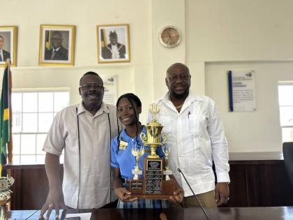 Khadijah Wright is flanked by Custos Hartley Perrin (left) and Westmoreland Mayor Danree Delancy during a courtesy call  at the Westmoreland municipal office.
