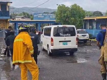 Police and firefighters at Balcombe Drive Primary and Junior High School in Olympic Gardens, St Andrew, where a section of a building collapsed, killing a man and injuring another on September 1, 2026. 