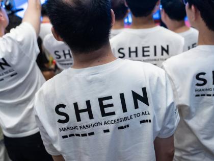 A logo of fast-fashion retailer Shein is seen on T-shirts at the listing ceremony in Hong Kong on Tuesday, September 1. AP 