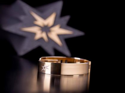 An image of the World Ultimate Championships trophy and bracelet.