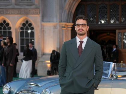 Theo James sharpens his classic tailoring with polka dots.