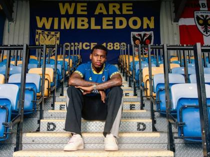 Dujuan Richards in thee stands a Wimbledon.