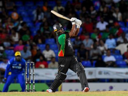 St Kitts and Nevis opening batsman, Johnson Charles strikes on his way to 78 against the Barbados Tridents a Warner Park on Tuesday night.
