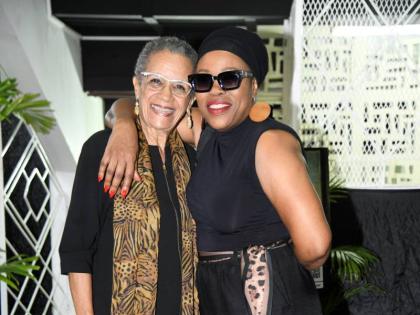 Veteran broadcaster Fae Ellington (left) shares the frame with Queen Ifrica at Sheldon Shepherd’s album listening event at the Philip Sherlock Centre for the Creative Arts at The University of the West Indies, Mona campus, on September 9. 