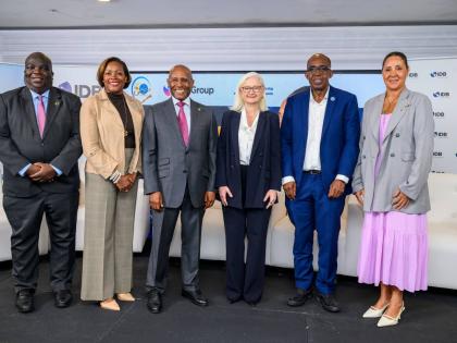 From left: United Nations (UN) Resident Coordinator in Jamaica, Dennis Zulu; Private Sector Organization of Jamaica (PSOJ) Executive Director, Sacha Vacciana-Riley; Minister of Industry, Investment and Commerce, Senator the Hon Aubyn Hill; Inter-Developmen
