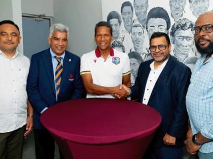 CEO of CWI, Chris Dehring (centre) and President of Cricket Canada, Arvinder Khosa (second right) shake hands during a recent meeting.