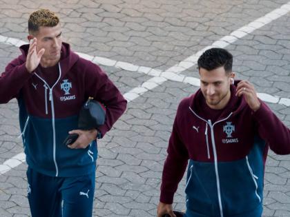 Portugal’s Cristiano Ronaldo (left) and Diogo Dalot arrive for training in Copenhagen, Denmark on Wednesday ahead of their Nations League  match against Denmark. 